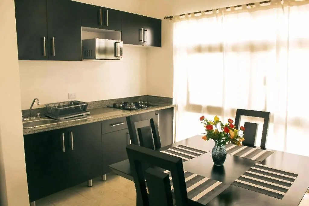 Апартаменты Hermoso Departamento En La Avenida Colosio Плая-дель-Кармен